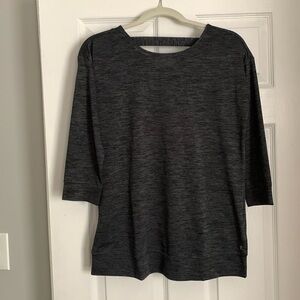 Izod work out shirt with criss cross detail in back. Size small
